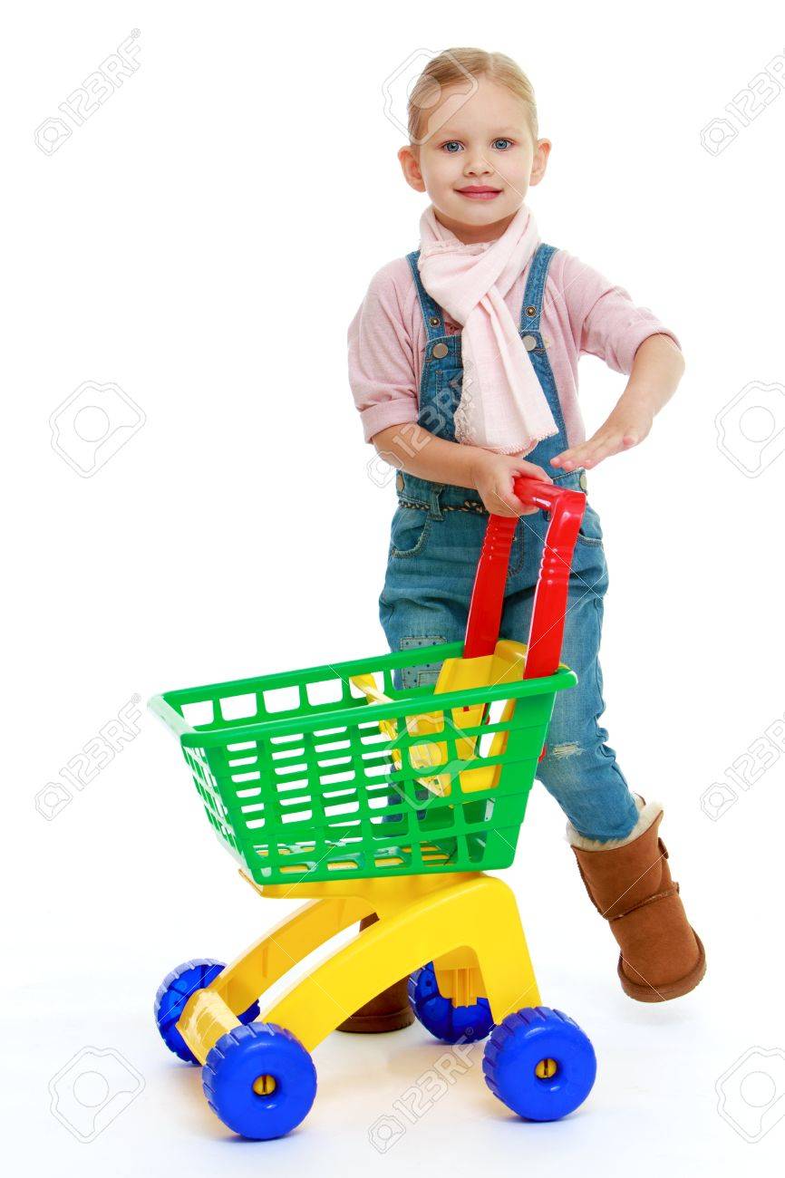 Charming little girl with a toy truck.Childhood education development in the Montessori school concept. Isolated on white background. - 33594342 Charming little girl with a toy truck.Childhood education development in the Montessori school concept. Isolated on white background. - 33594342