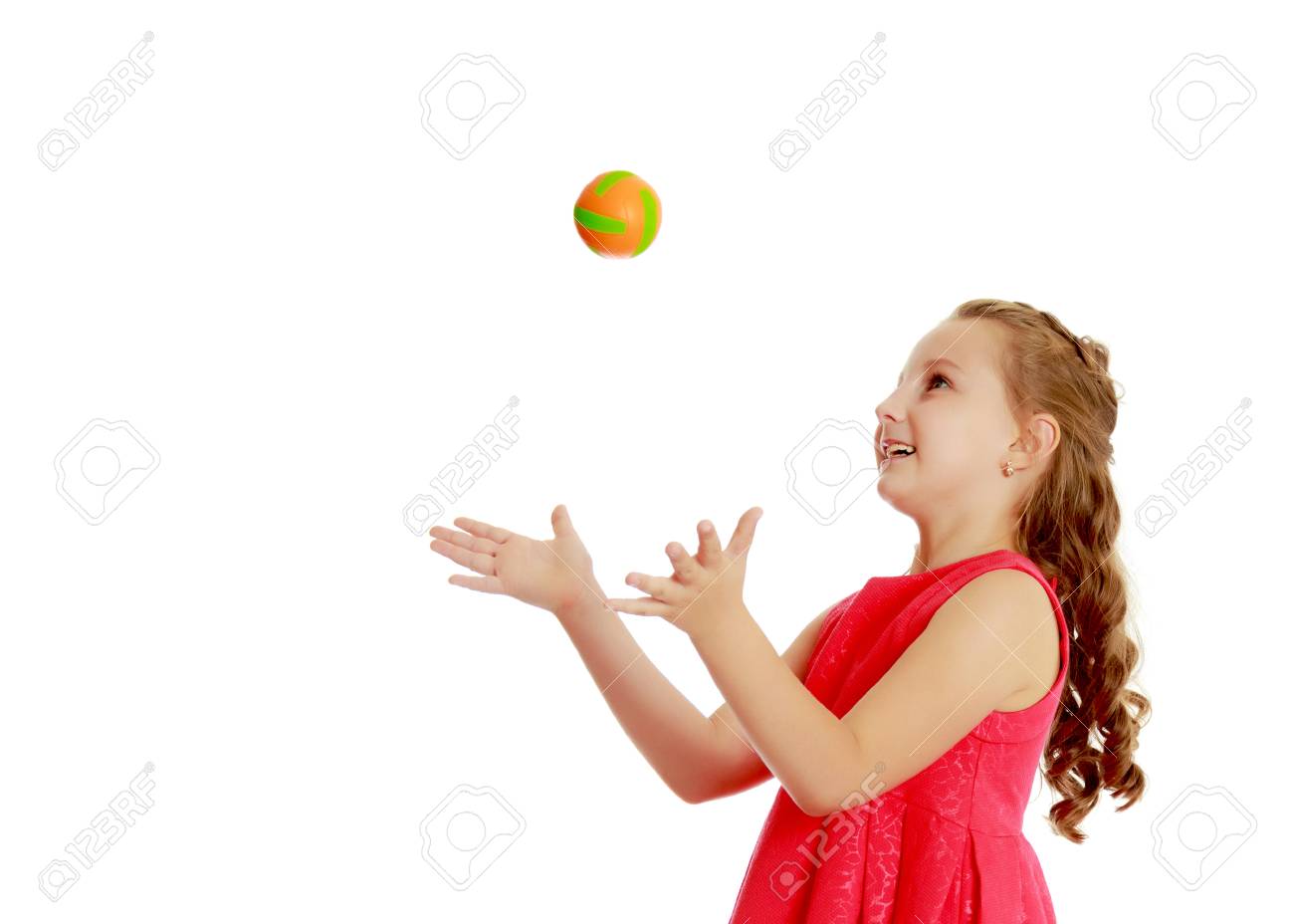 The little girl throws the ball up - 96583753 The little girl throws the ball up - 96583753