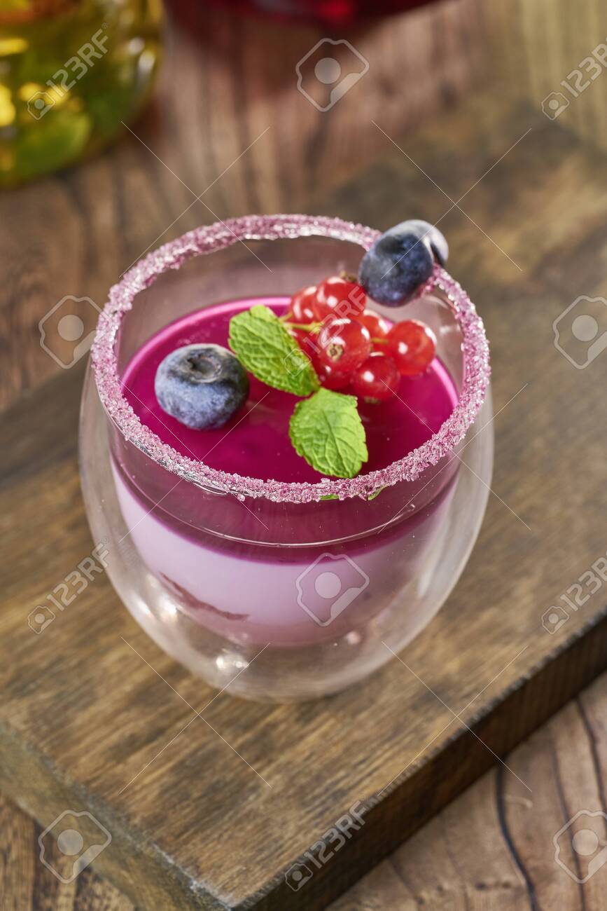 Italian dessert panna cotta with fresh berries and mint - 133057512 Italian dessert panna cotta with fresh berries and mint - 133057512