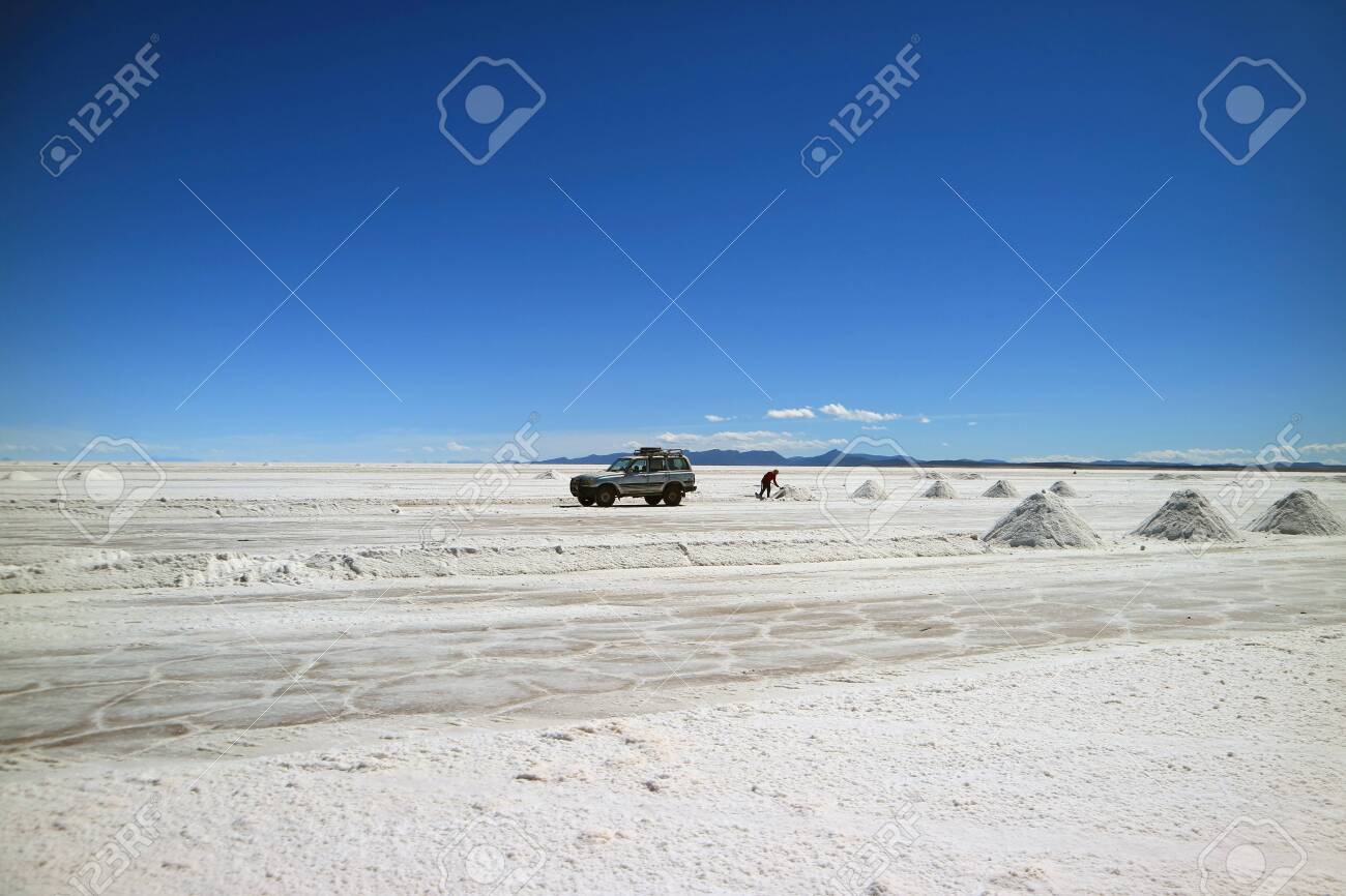 Salt Miner Extracting Salt On Uyuni Salt Flats Or El Salar De Stock Photo Picture And Royalty Free Image Image 122771507