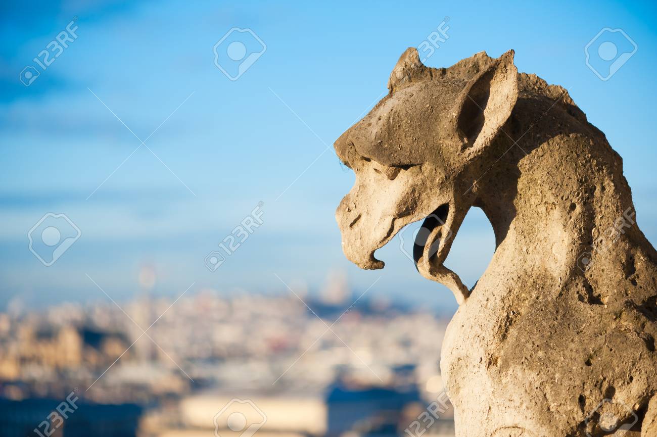 Gargoyle against blue sky and blurry city - Paris - 83862759 Gargoyle against blue sky and blurry city - Paris - 83862759