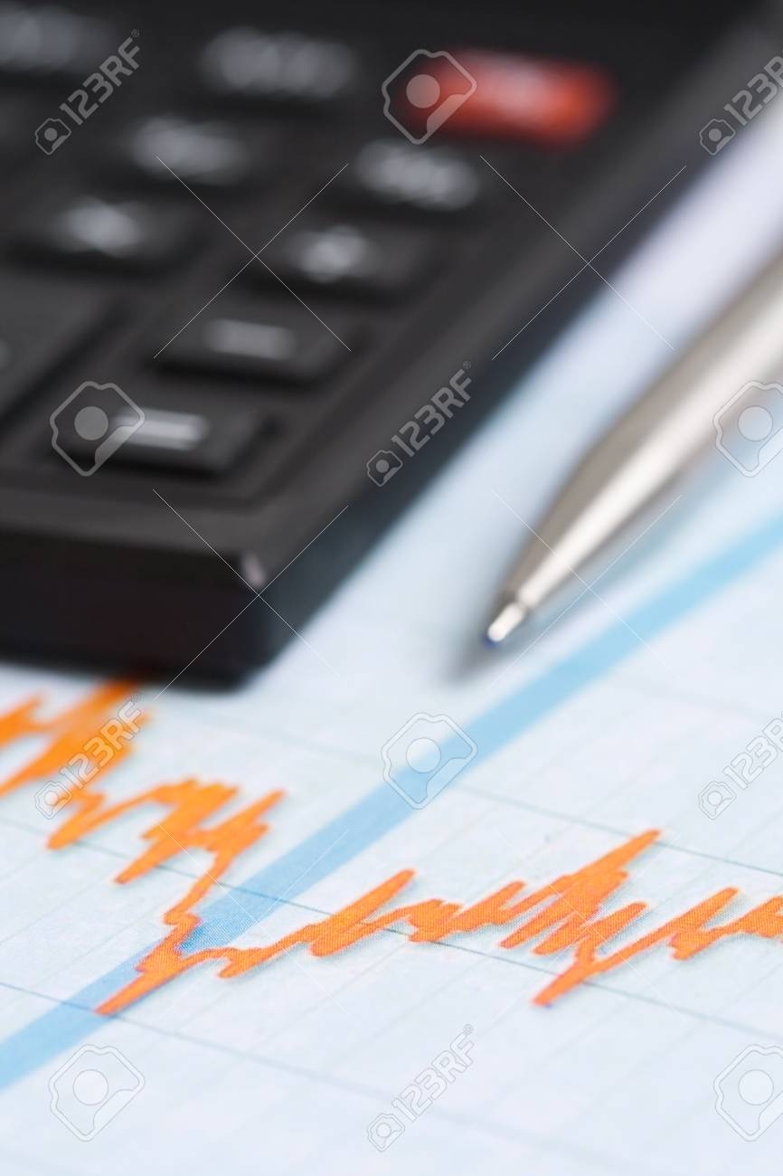 pencil anc calculator over paper report stock photo picture and