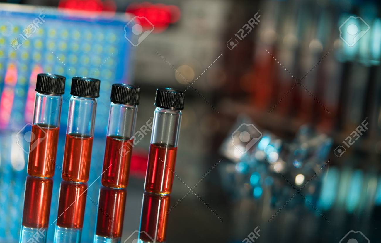 Thick body black transsexual model pam rear Stock photo laboratory tech with test tube of blood