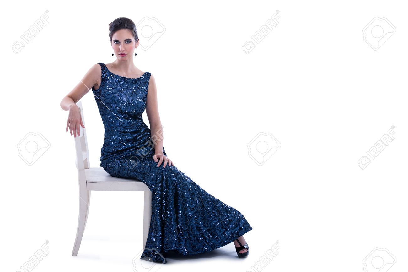 Beautiful Luxurious Woman Sitting On Chair In Elegant Dress Stock Beautiful Luxurious Woman Sitting On Chair In Elegant Dress Stock
