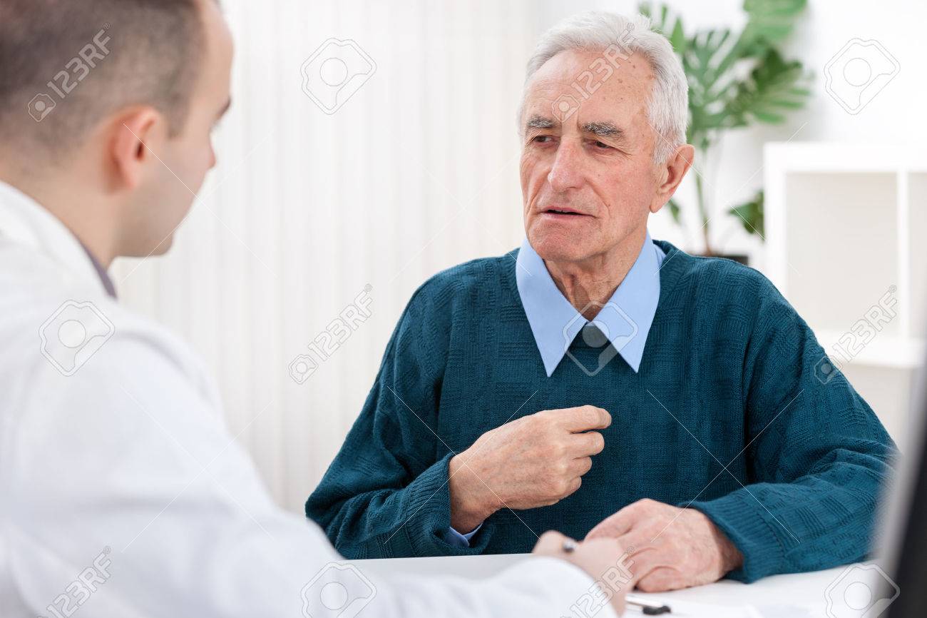 Senior Man Sits With His Doctor And He Complained Of Chest Pain Stock Photo Picture And Royalty Free Image Image 23961927