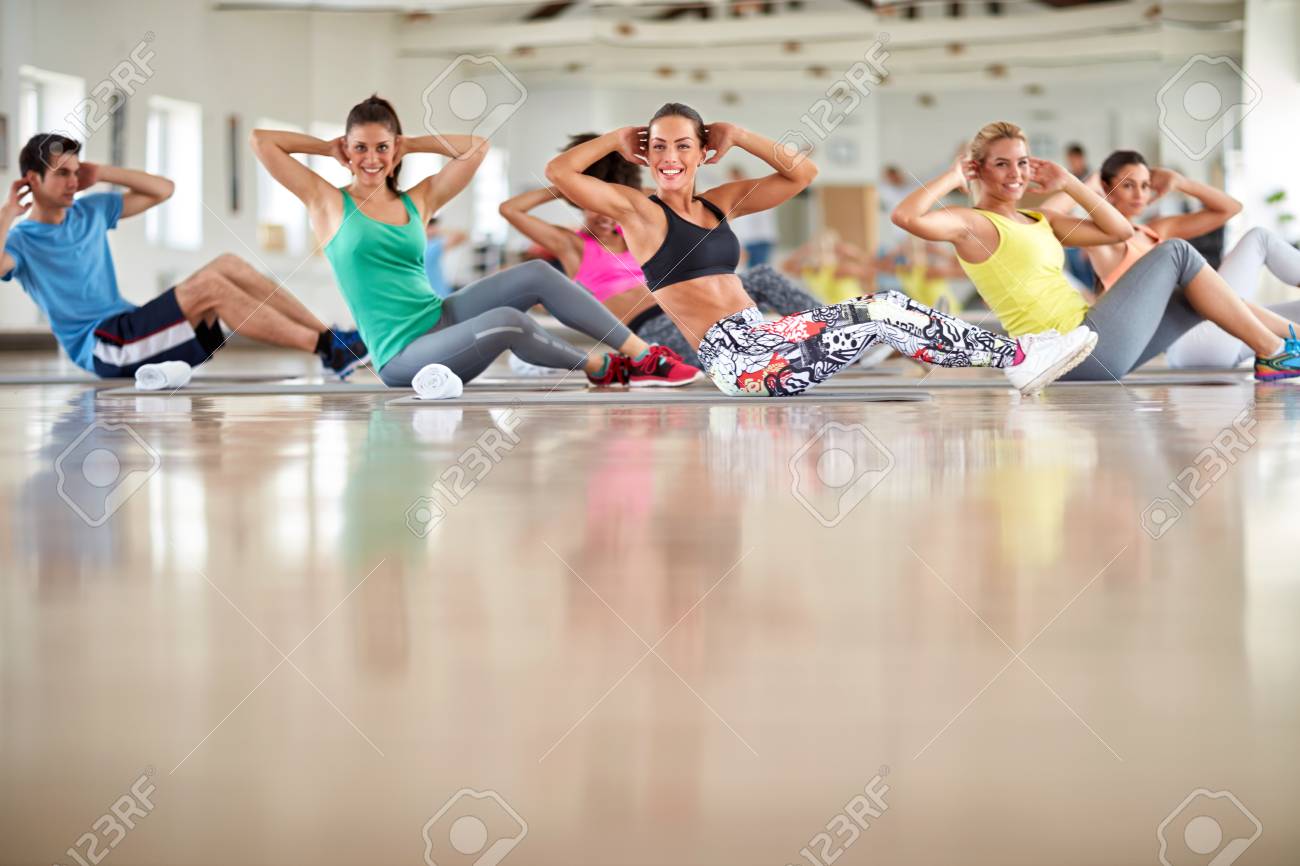 Group of young people on training at gym - 86178206 Group of young people on training at gym - 86178206