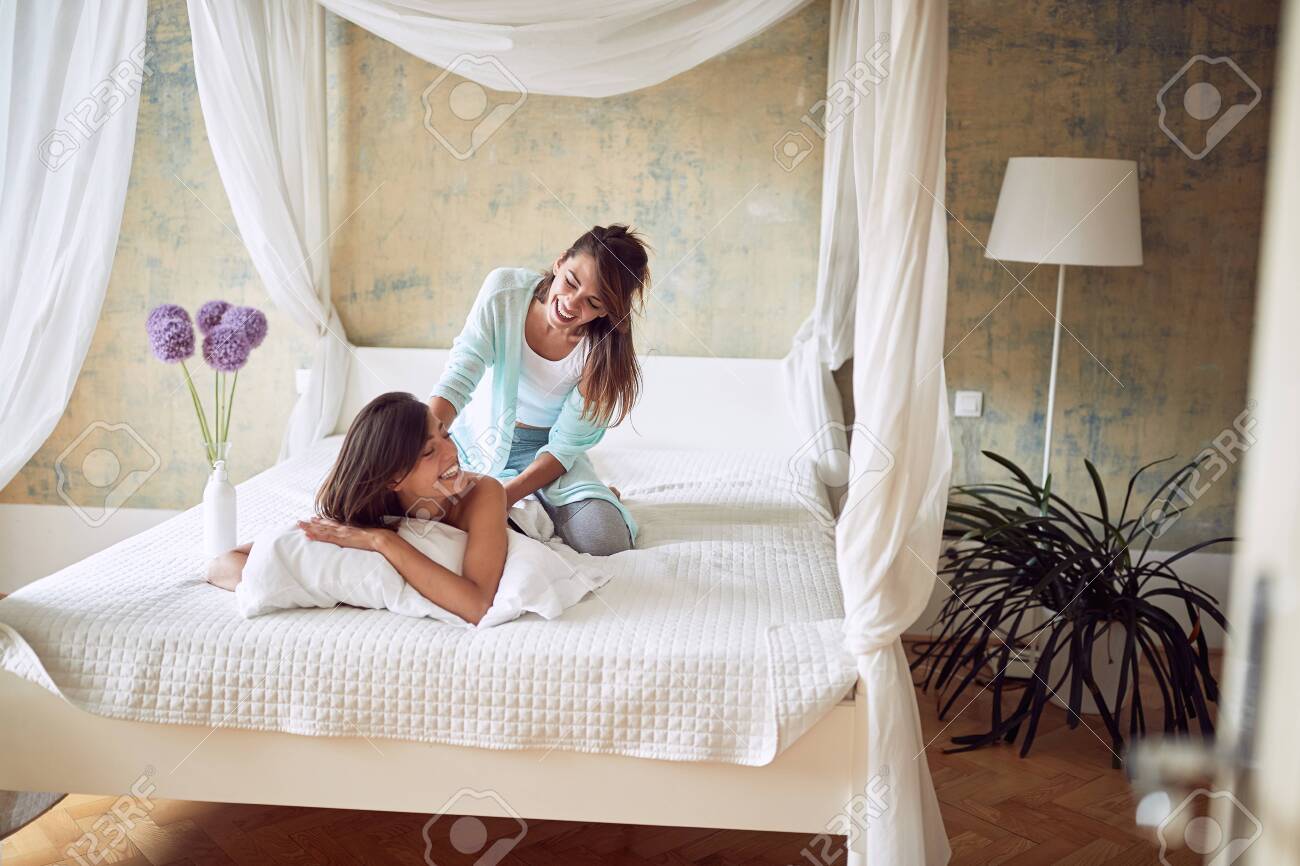 Young Adult Female Doing Massage To Another Woman. Relationship, Friends,  Love, Seduction, Lesbians Stock Photo, Picture and Royalty Free Image.  Image 146680333.