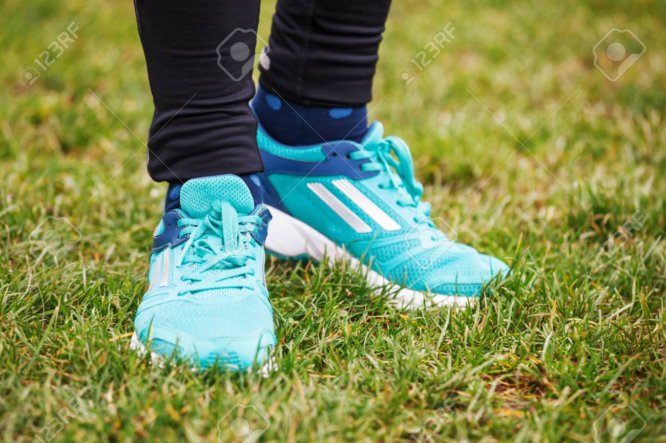 running shoes on grass