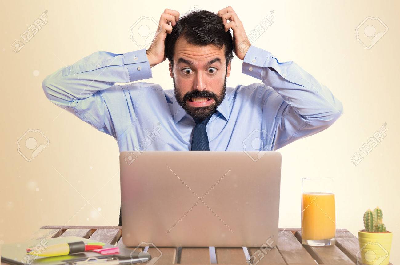 frustrated businessman over white background - 37676021 frustrated businessman over white background - 37676021