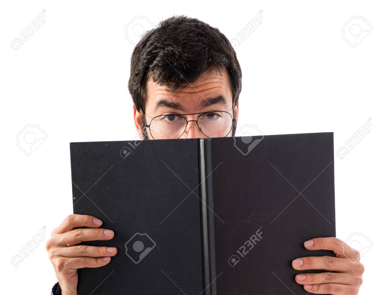 Vintage young man hiding behind a book - 42316643 Vintage young man hiding behind a book - 42316643