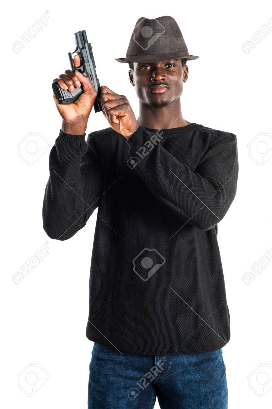 Black Man Holding A Pistol Stock Photo, Picture and Royalty Free Image.  Image 57754062.
