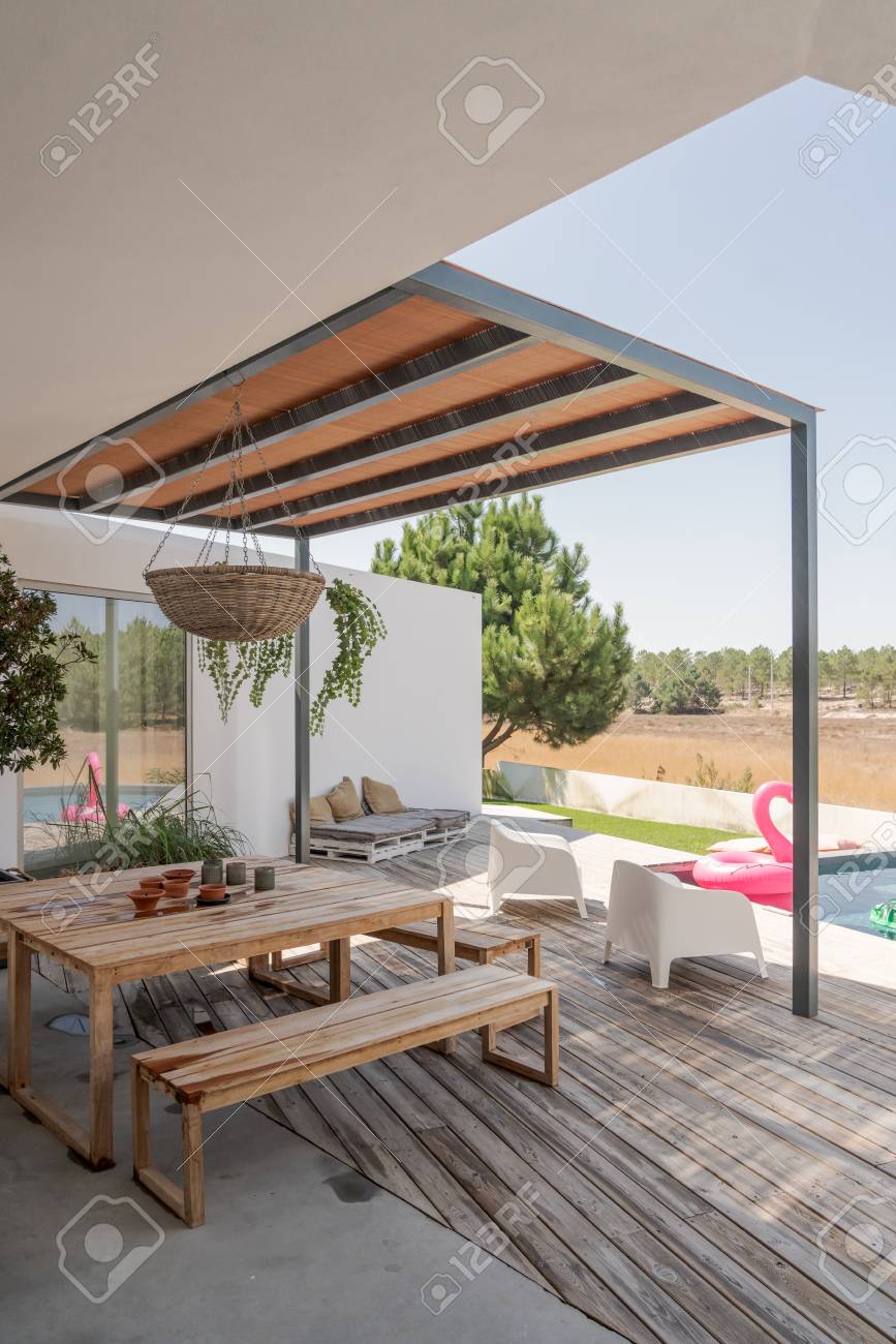 Modern House With Garden Swimming Pool And Wooden Deck Stock Photo Picture And Royalty Free Image Image 117135126