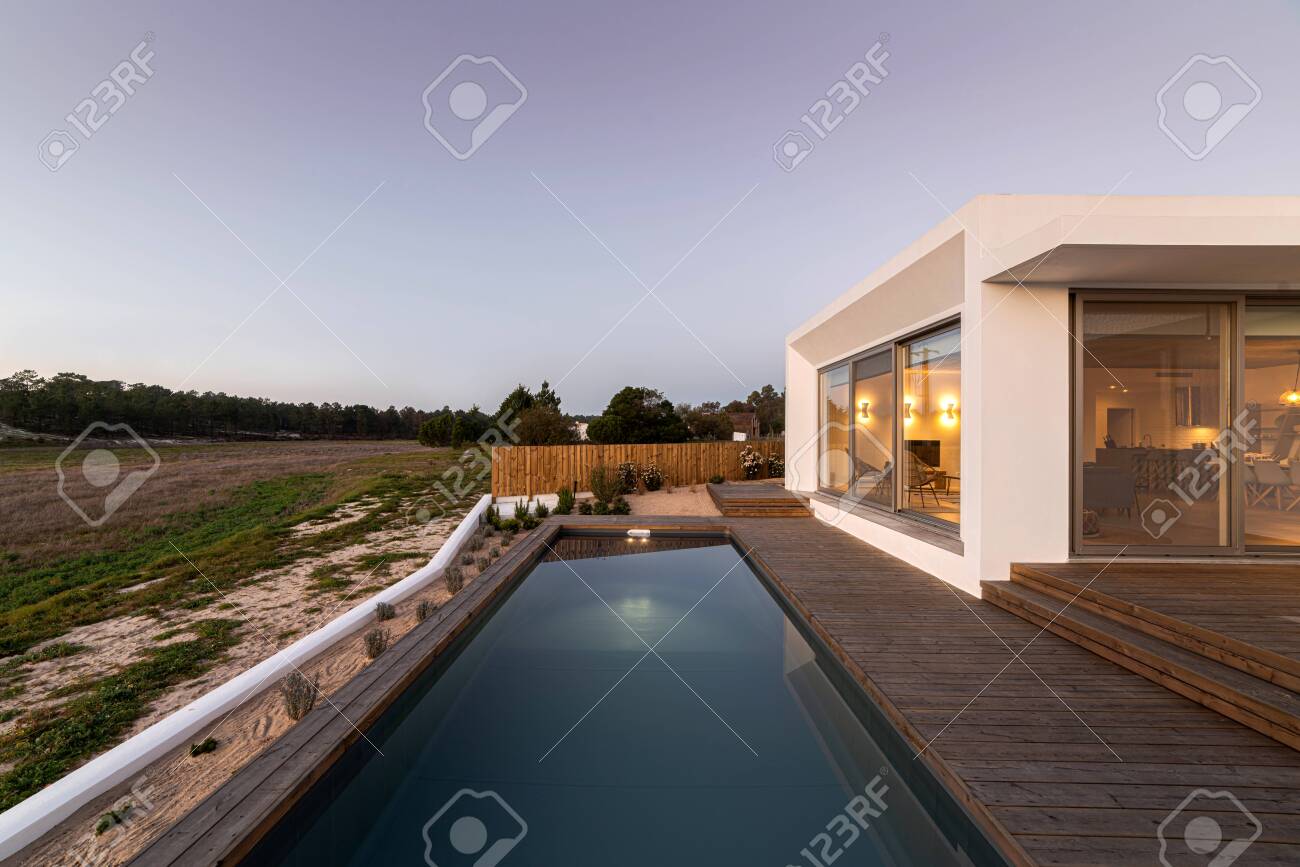 Swimming Pool With Wooden Deck View On Modern Villa Stock Photo Picture And Royalty Free Image Image 141658046