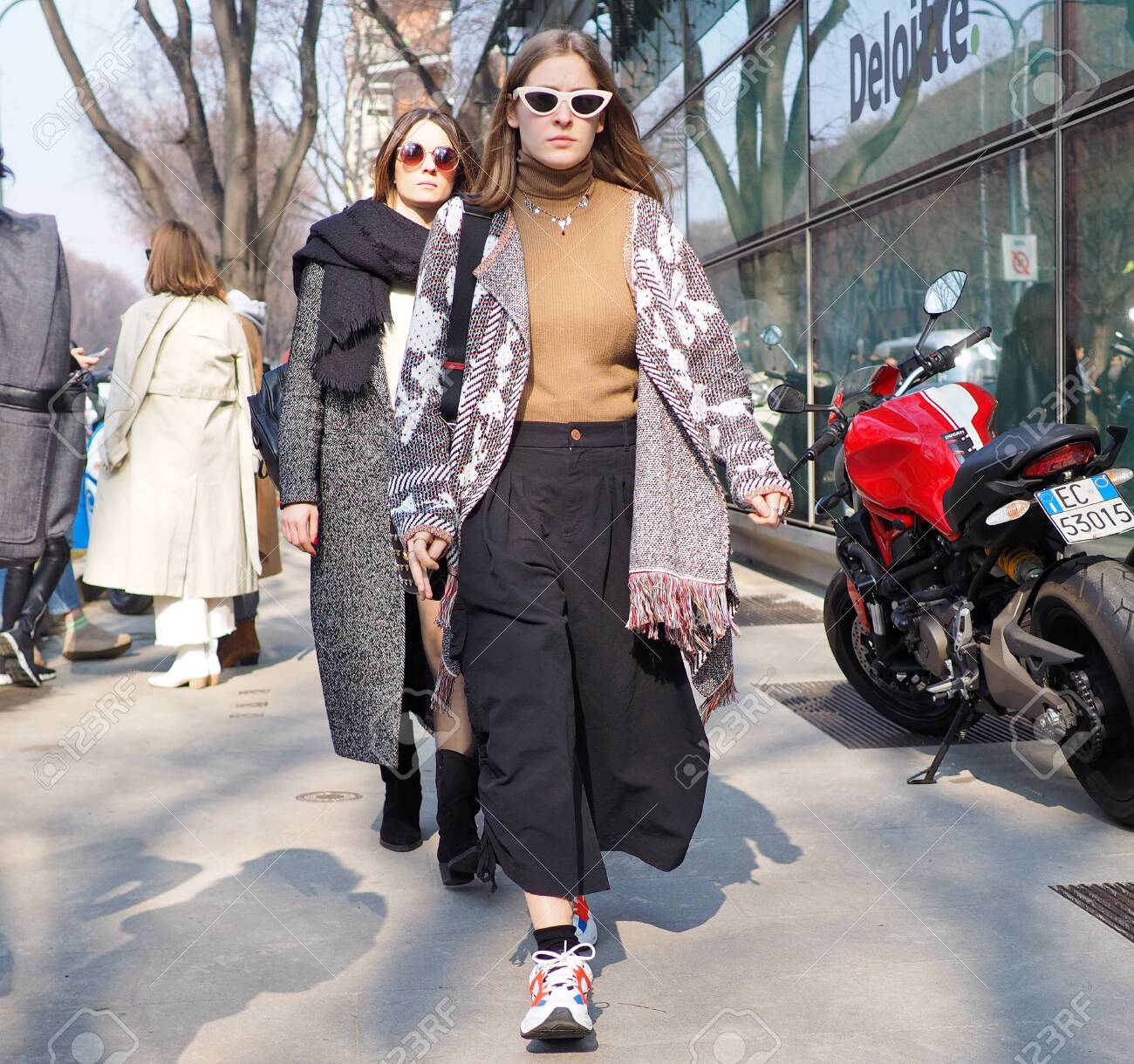 MILAN, Italy February 21, 2019 Fashion blogges street style..
