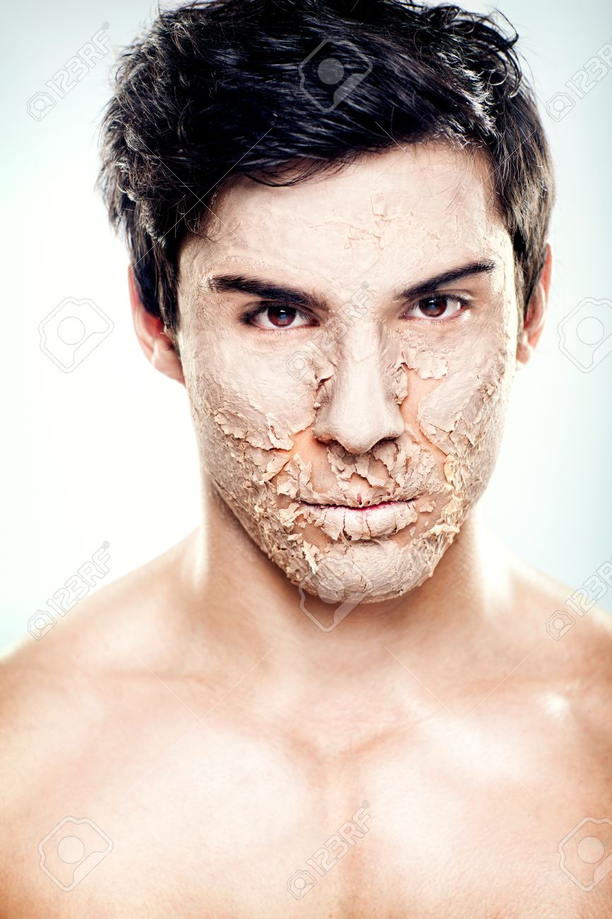 a handsome male model with the skin his face peeling stock photo