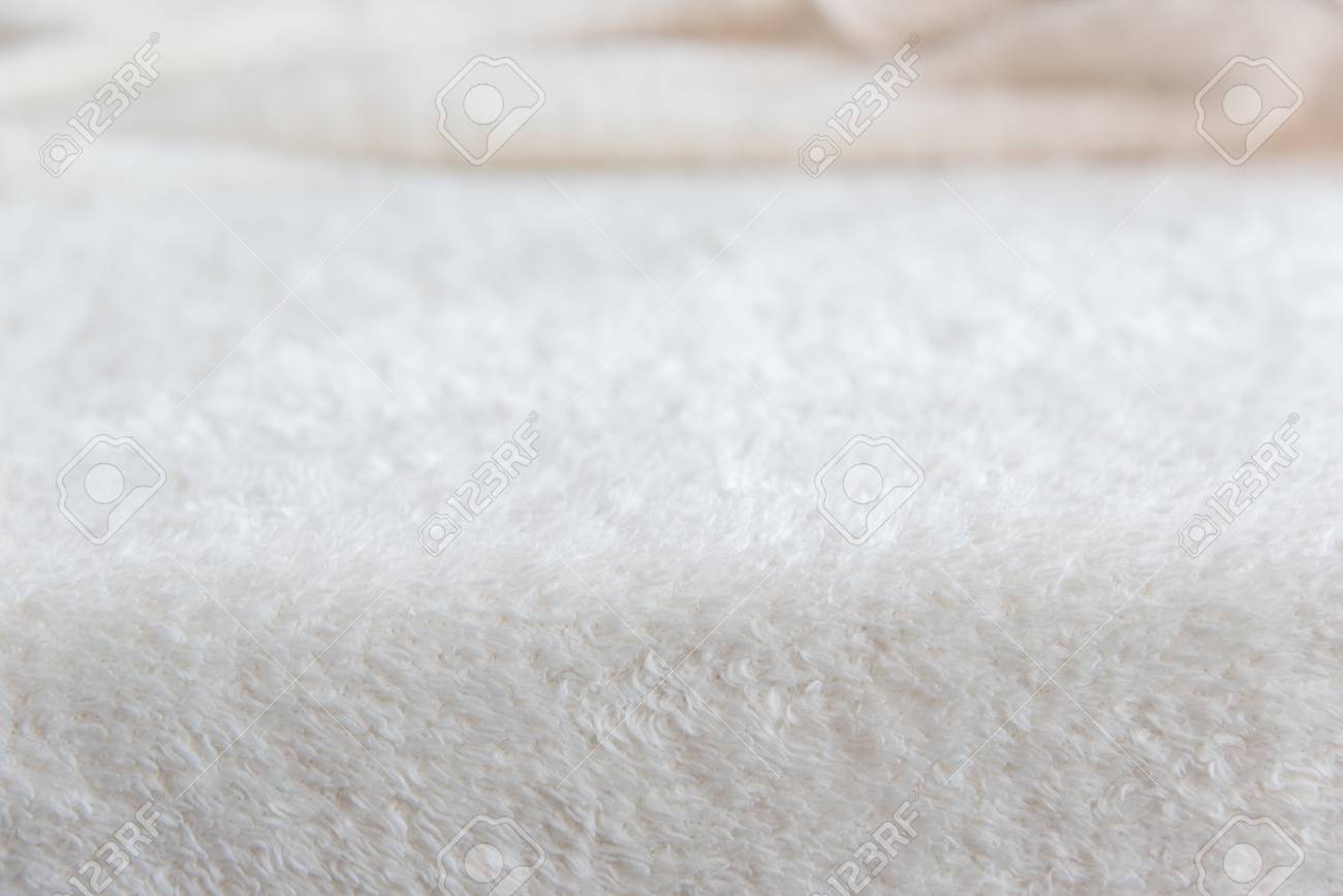 White delicate soft background of plush fabric. Texture of beige soft fleecy blancet - 117030512 White delicate soft background of plush fabric. Texture of beige soft fleecy blancet - 117030512