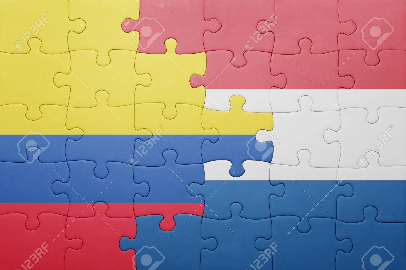 Rompecabezas Con La Bandera Nacional De Países Bajos Y Colombia. Concepto Fotos, Retratos, Imágenes Y Fotografía De Archivo Libres De Derecho. Image 49748666.