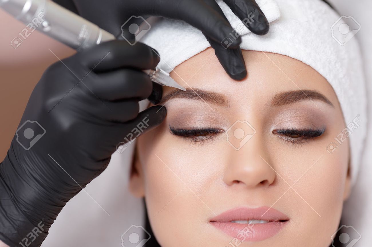 permanent makeup tattooing of eyebrows stock photo picture and