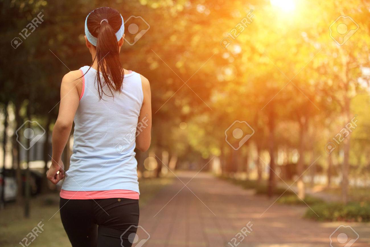 healthy lifestyle woman running at city park pavement - 51331050 healthy lifestyle woman running at city park pavement - 51331050