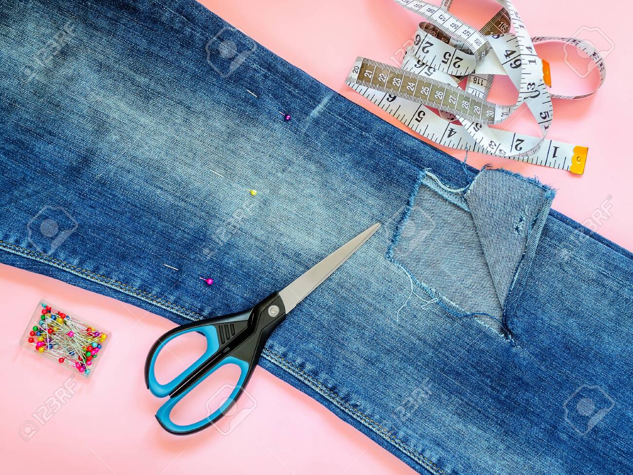 jeans with holes below the knee