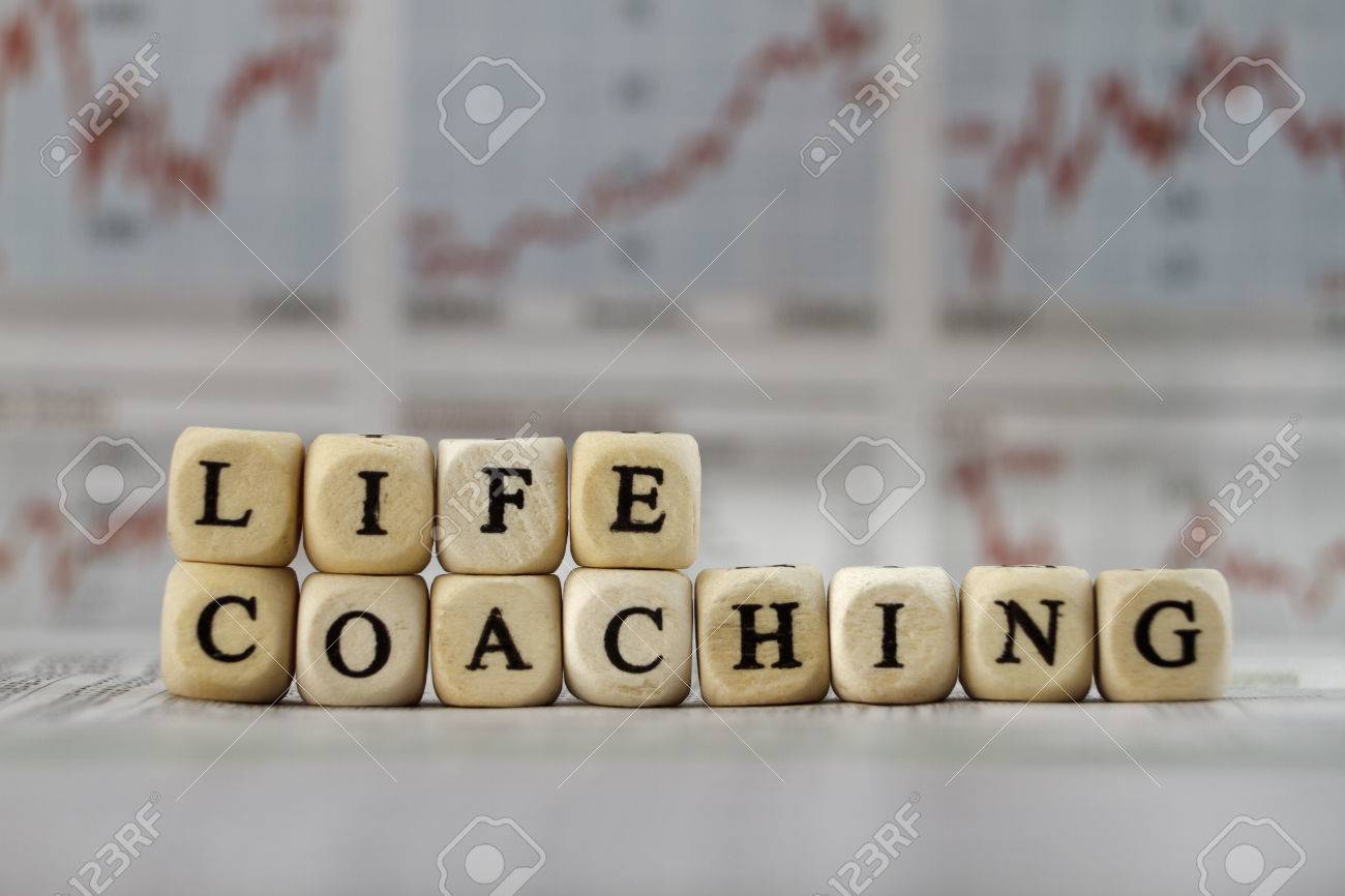 Life Coaching word built with letter cubes on newspaper background - 39316908 Life Coaching word built with letter cubes on newspaper background - 39316908