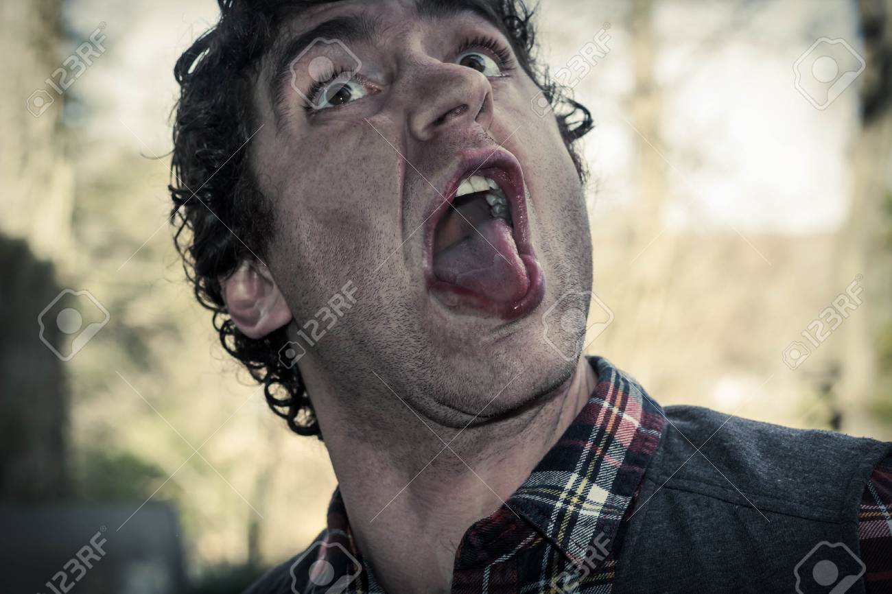 ガラス面に対して狂った狂人男 Smooshes 顔 の写真素材 画像素材 Image