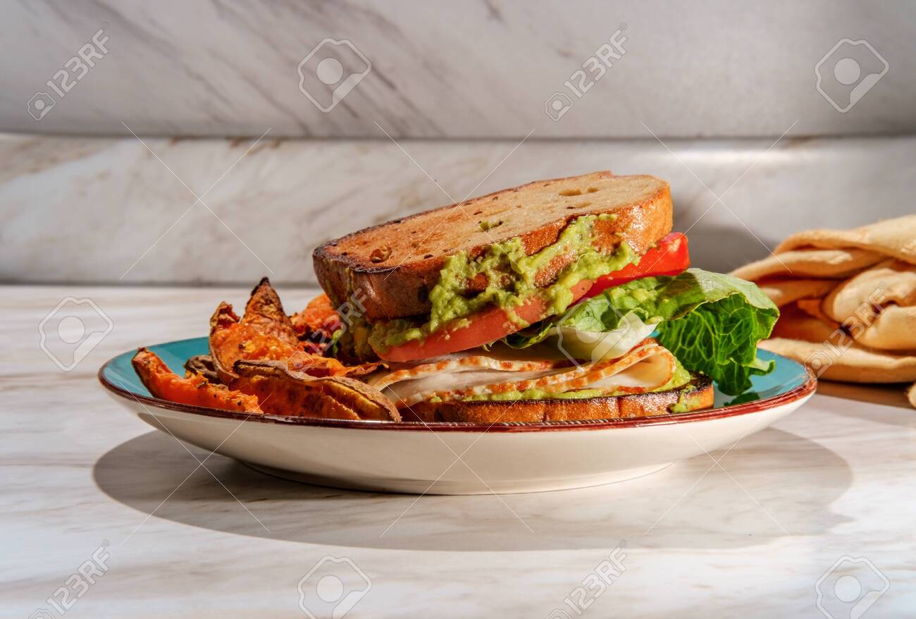 Deli Chicken Guacamole Sandwich On Gluten Free Sliced Bread With Stock Photo Picture And Royalty Free Image Image 148940054