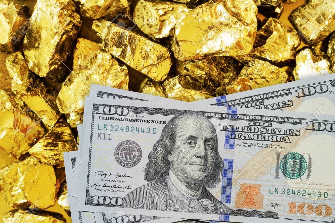 One hundred dollar banknotes on gold mine close up. Mining industry concept with dollars and gold - 110302794 One hundred dollar banknotes on gold mine close up. Mining industry concept with dollars and gold - 110302794