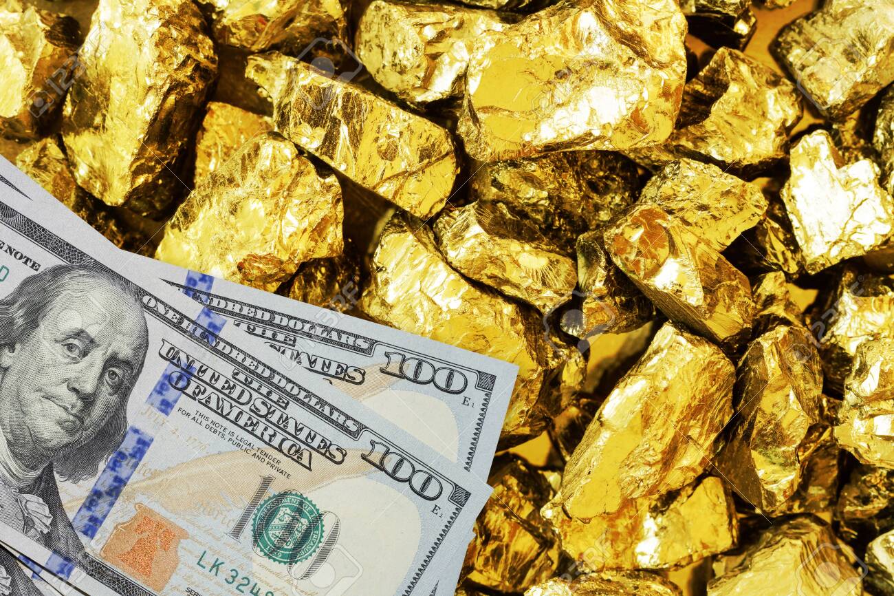 One hundred dollar banknotes on gold mine close up. Mining industry concept with dollars and gold - 110303607 One hundred dollar banknotes on gold mine close up. Mining industry concept with dollars and gold - 110303607