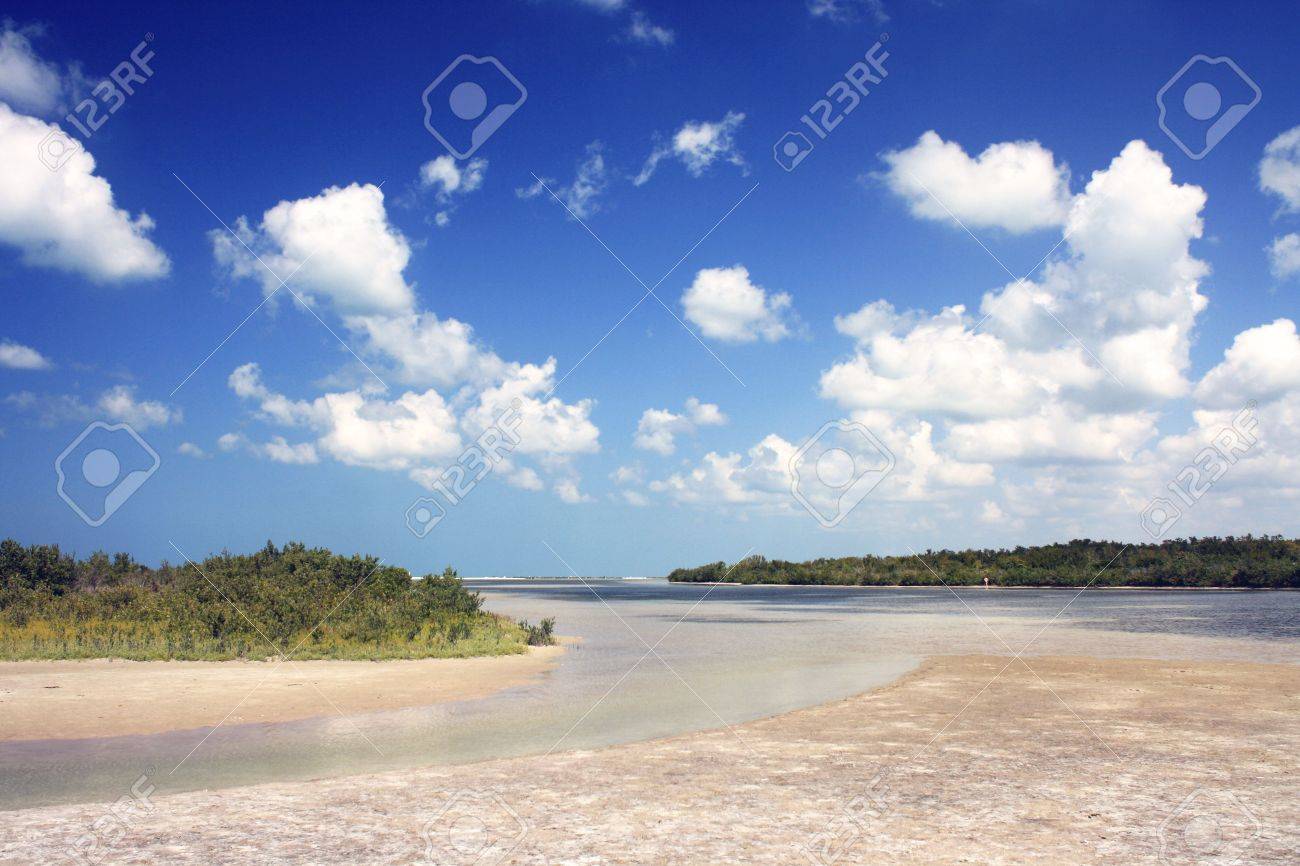 View a beach on Marco Island, located on the west coast of Florida in the Gulf of Mexico. Place known for its tourist attractions. - 4870234 View a beach on Marco Island, located on the west coast of Florida in the Gulf of Mexico. Place known for its tourist attractions. - 4870234