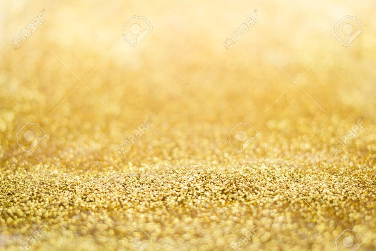 abstract golden glitter light bokeh holiday party background stock holiday party background