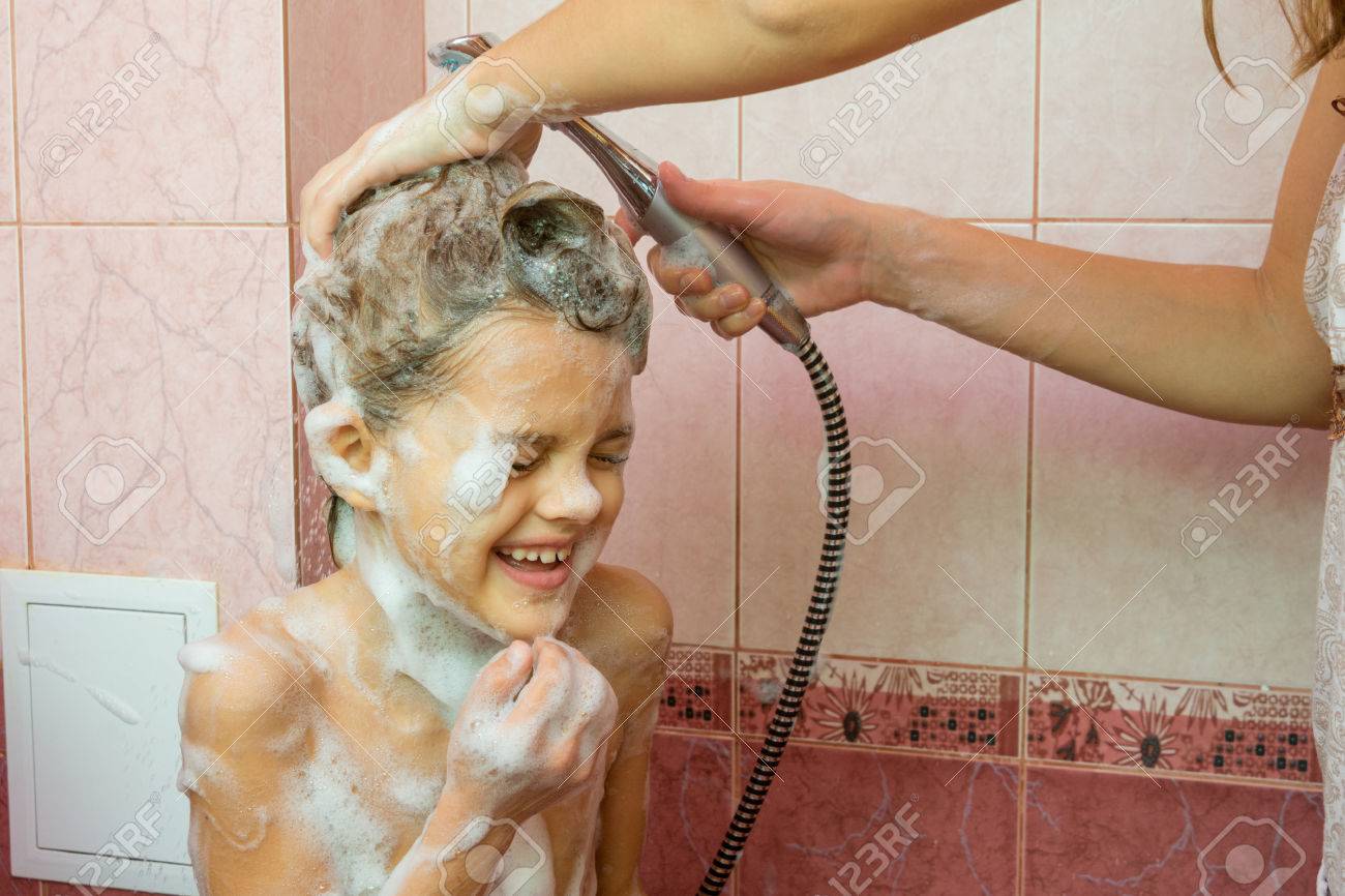 Mom Washes The Soap And Shampoo In The Shower With A Seven-year Daughter  Stock Photo, Picture and Royalty Free Image. Image 68195998.