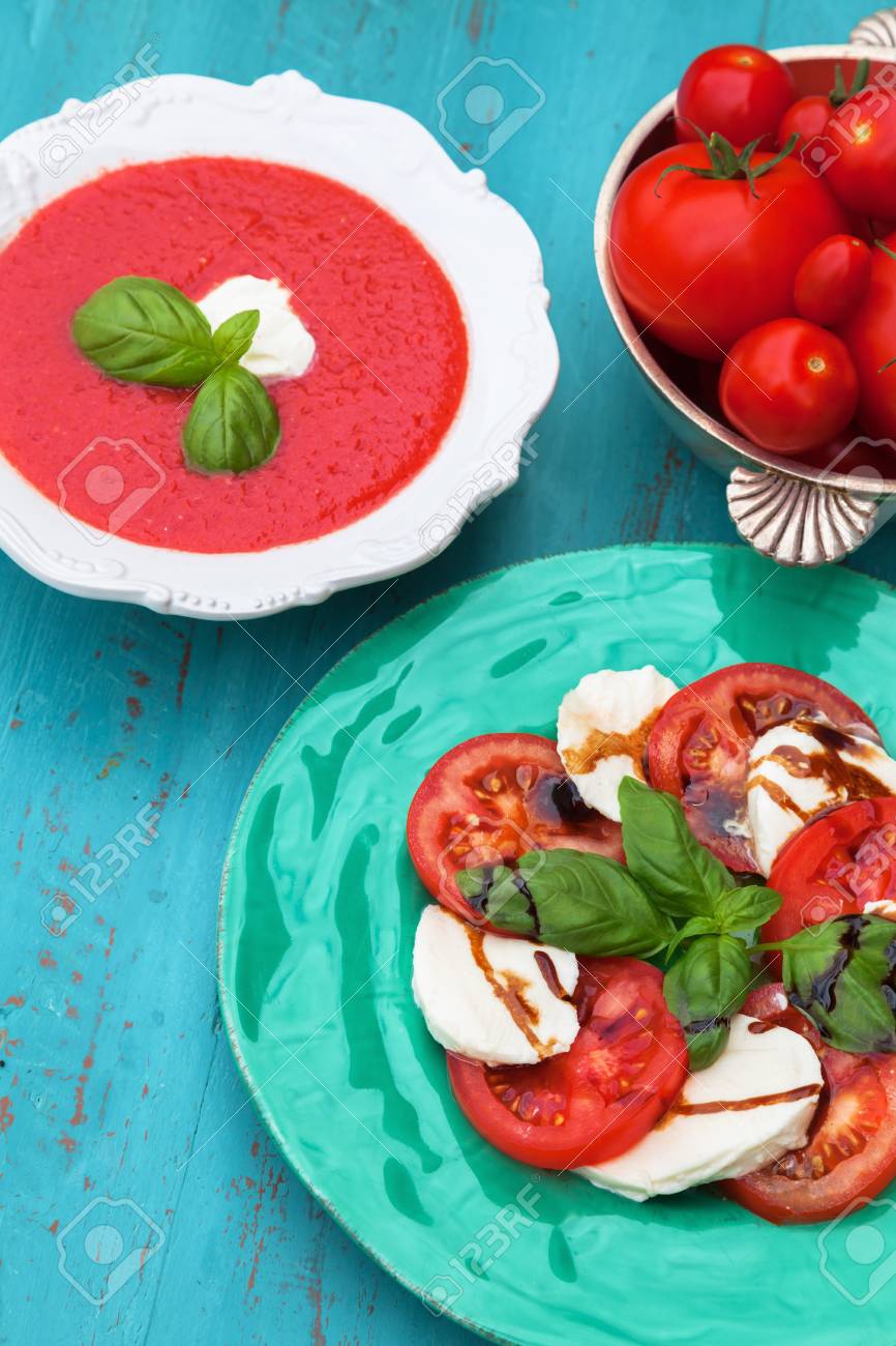 Greenplate With Caprese Salad A Tomato Soup And A Bowl With Stock Photo Picture And Royalty Free Image Image 51833943