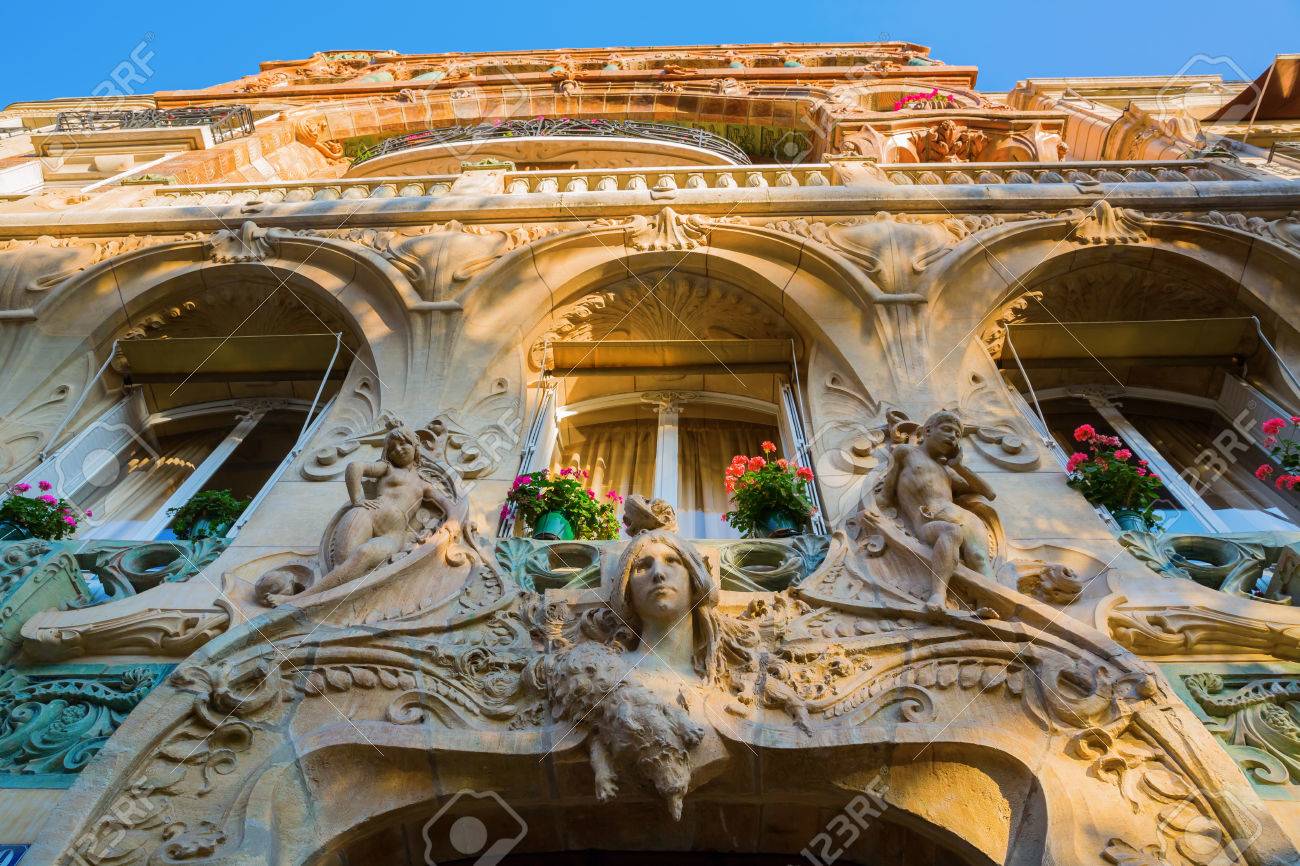 facade of an art nouveau building in paris france stock photo