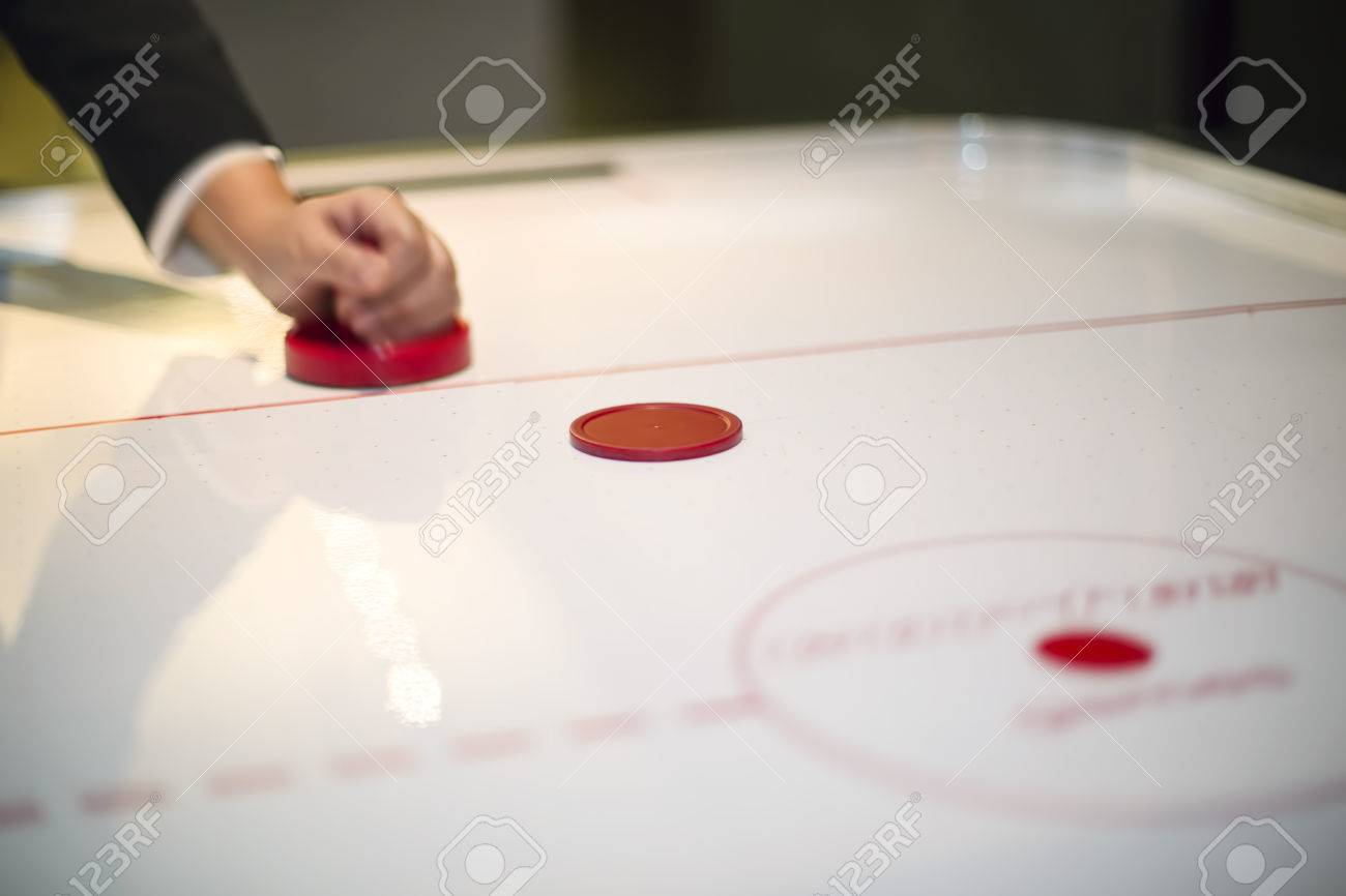 Hand On A Mallet Over Air Hockey Table Stock Photo Picture And