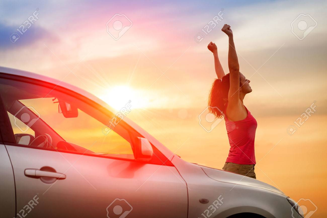 Female Driver Beside Car Raising Arms And Feeling The Freedom Stock Photo Picture And Royalty Free Image Image 24256682