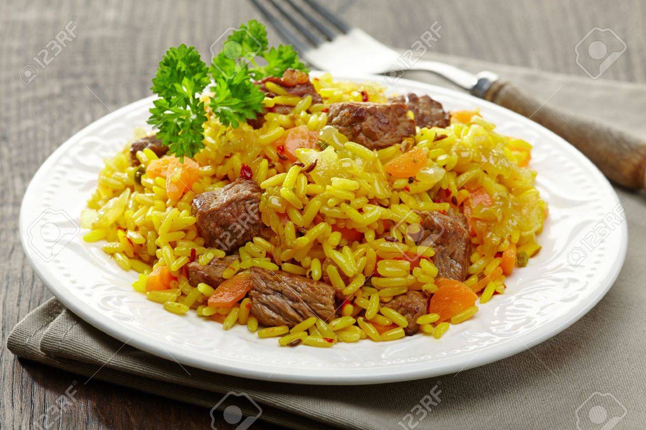 国立ウズベキスタン料理板上 plov ロイヤリティーフリーフォト