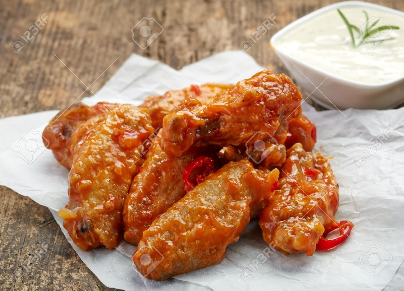 Fried Chicken Wings With Sweet Chili Sauce On White Paper Stock Photo Picture And Royalty Free Image Image 30508916