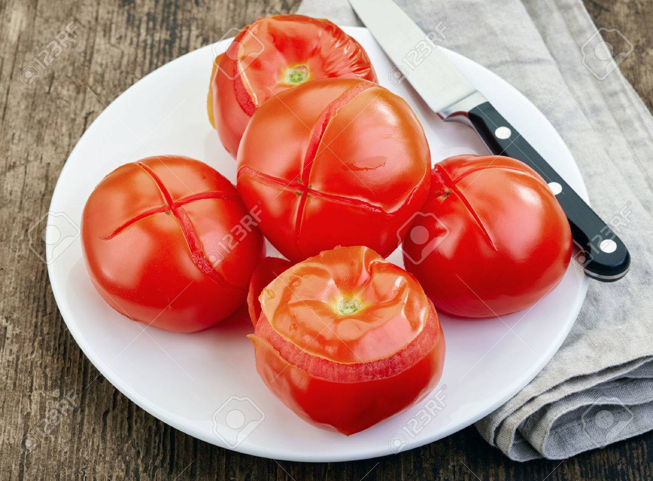 Blanched Tomatoes On Plate Ready For Peeling Stock Photo Picture And Royalty Free Image Image 42608785