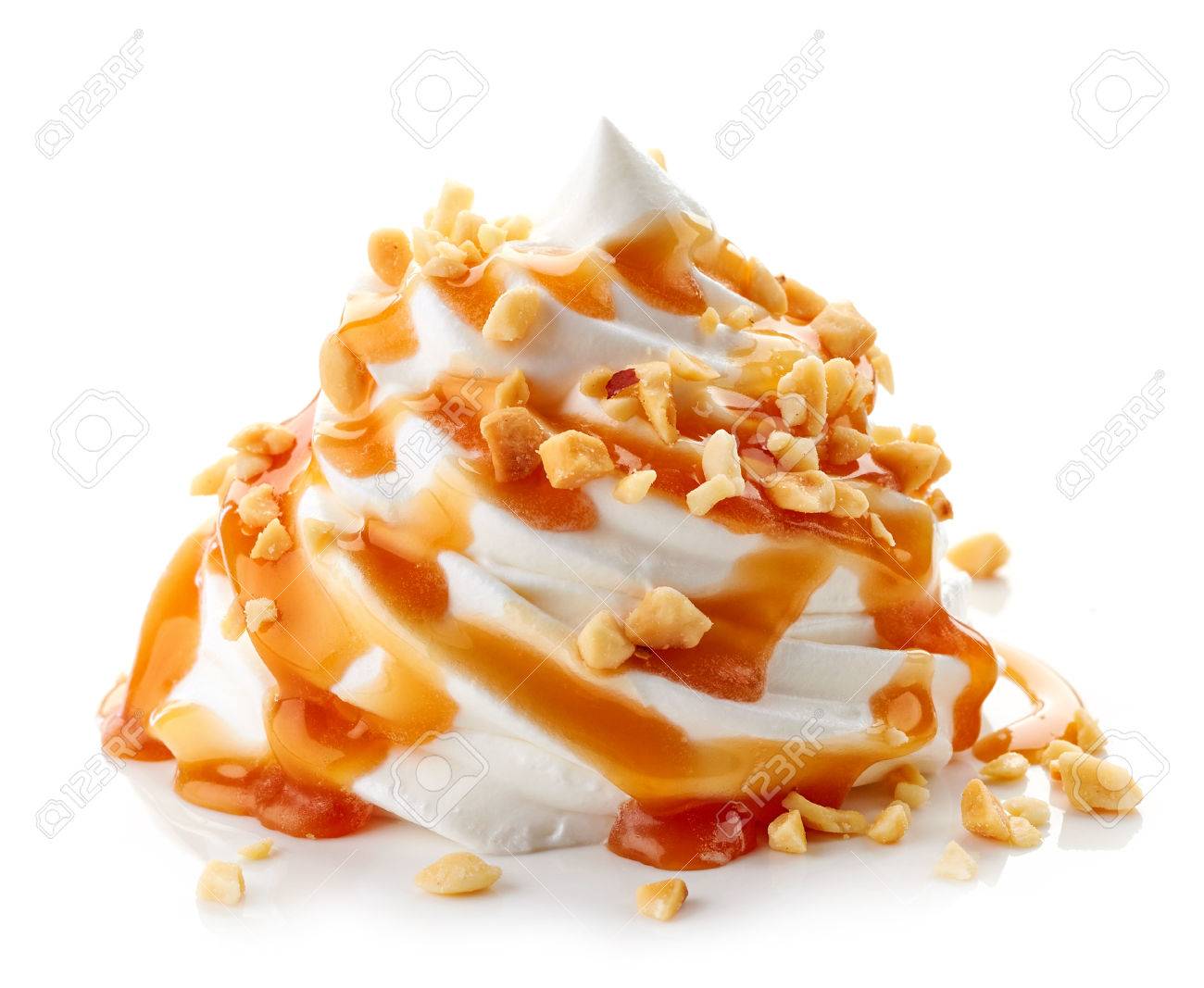 whipped cream with caramel sauce and nuts isolated on white background - 52935600 whipped cream with caramel sauce and nuts isolated on white background - 52935600