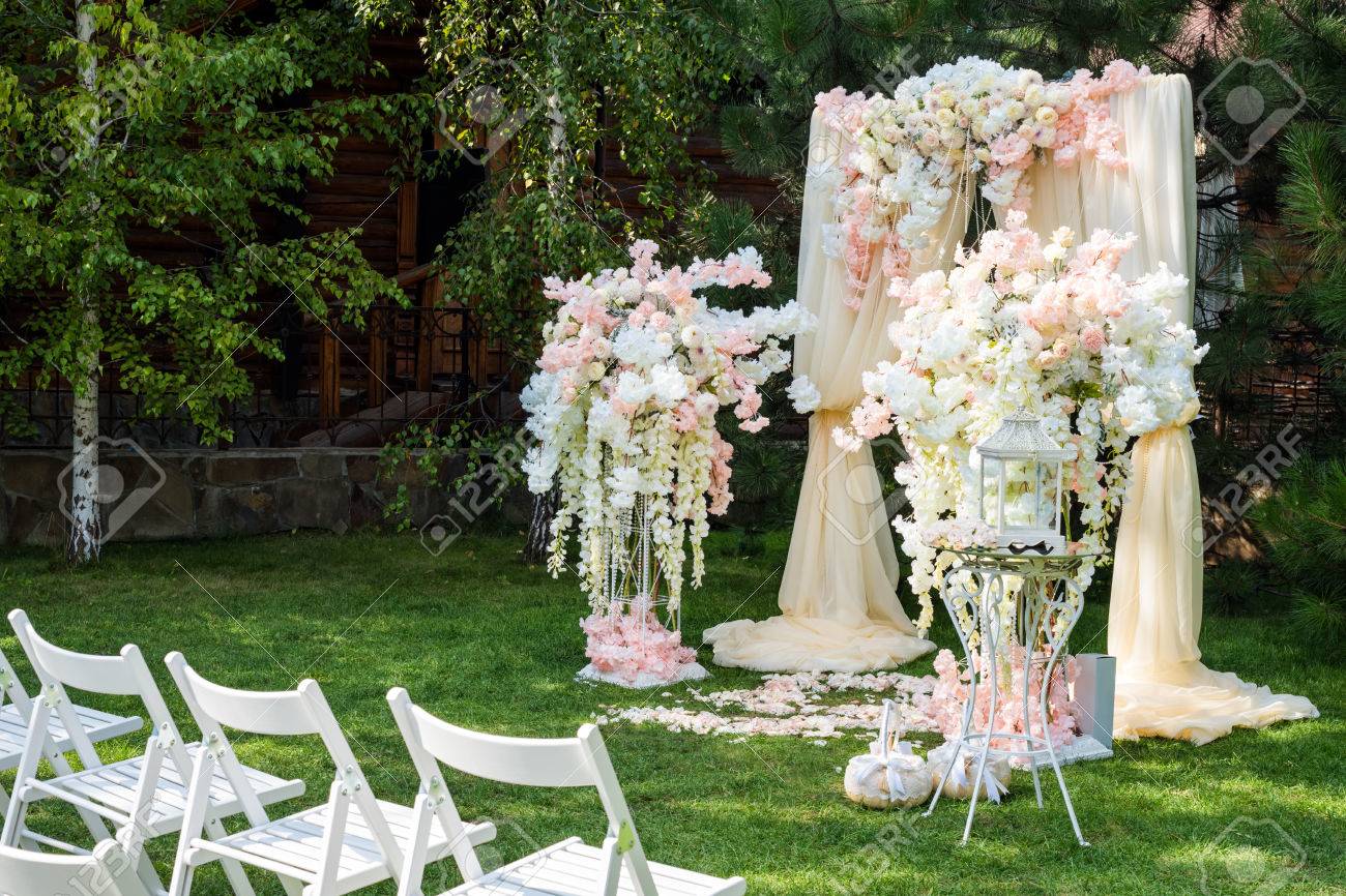 Wedding Arch Decorated With Cloth And Flowers Outdoors Beautiful