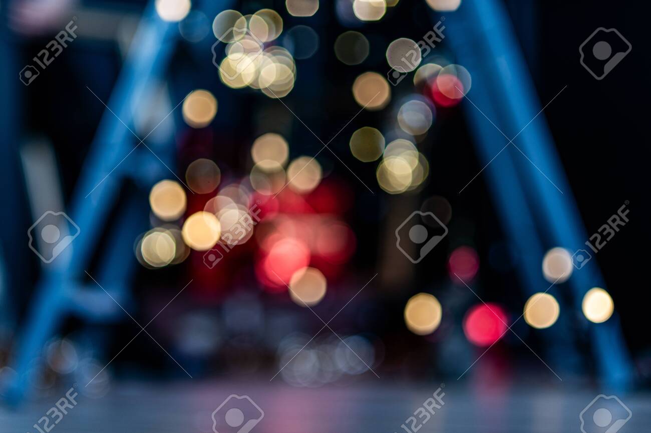 Blurry, abstract background of Christmas lights in a pre-holiday city. - 152896069 Blurry, abstract background of Christmas lights in a pre-holiday city. - 152896069