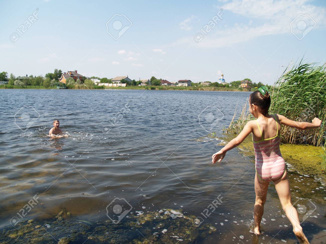 Children Swim And Having Fun In The River Stock Photo, Picture and Royalty  Free Image. Image 91261033.