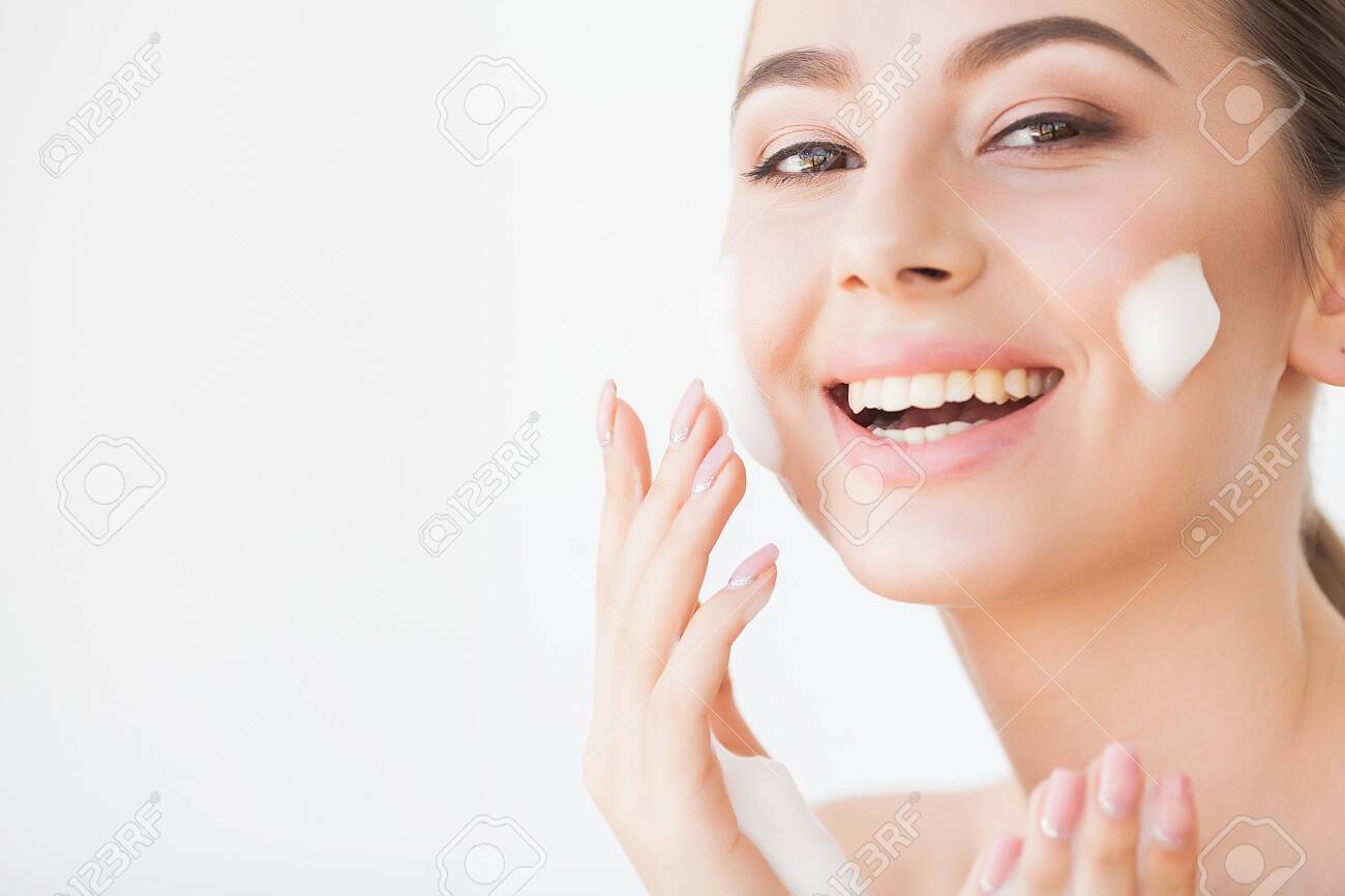 Beauty Face Care. Woman With Cream On Facial Skin - 123953581 Beauty Face Care. Woman With Cream On Facial Skin - 123953581