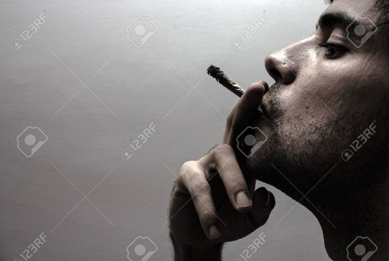 Profile of a person smoking - 23202353 Profile of a person smoking - 23202353