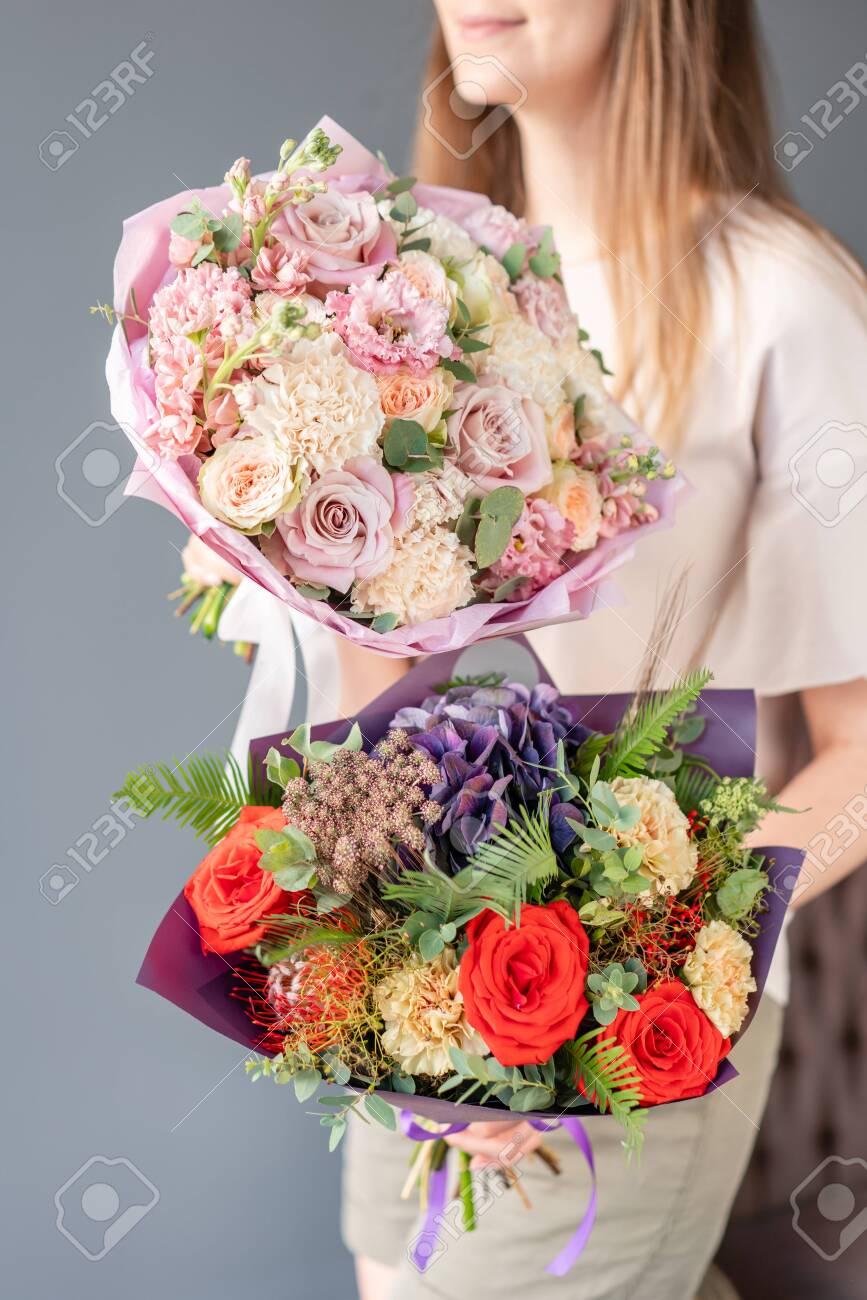 Two Small Beautiful Bouquets Of Mixed Flowers In Woman Hand Stock Photo Picture And Royalty Free Image Image 124377713