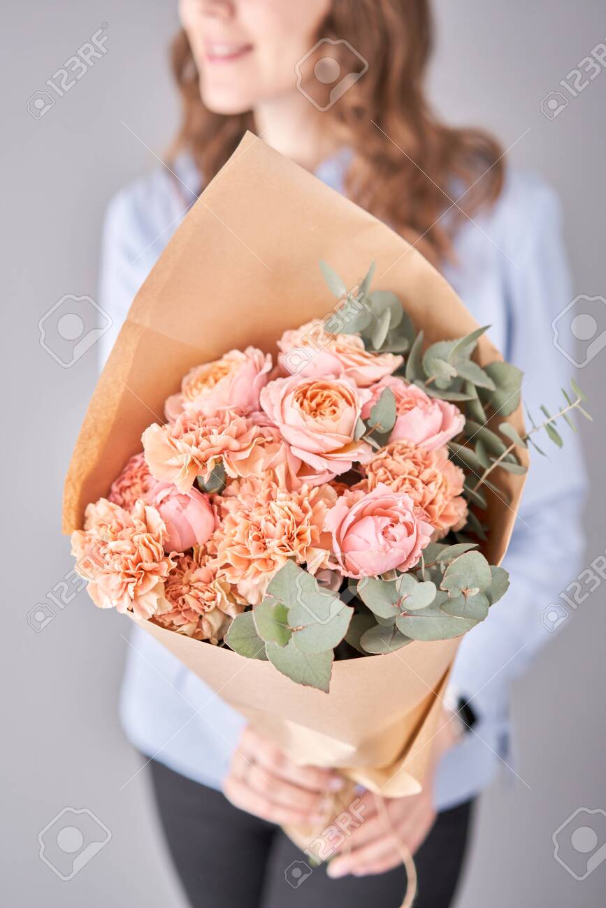 Flower Set In Womans Hands Fresh Cut Flowers For Decoration Stock Photo Picture And Royalty Free Image Image 143152593
