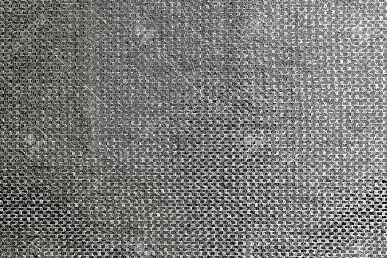 グラファイト色の背景の空の光沢のある真珠格子縞生地の抽象的なテクスチャ の写真素材 画像素材 Image
