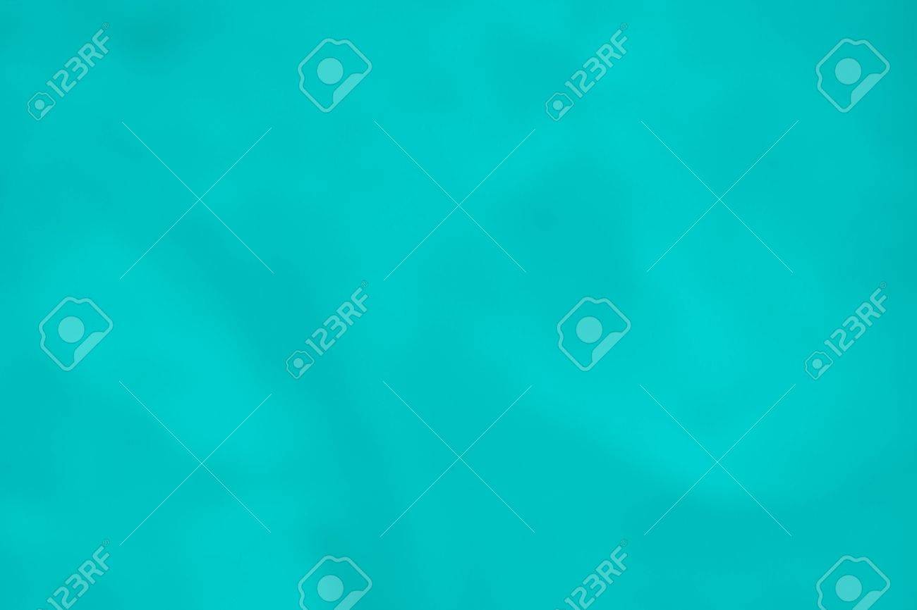 Continuous Smooth Texture And Background Of Paper Or Fabric Bright Turquoise Color Stock Photo Continuous Smooth Texture And Background Of Paper Or Fabric Bright Turquoise Color Stock Photo