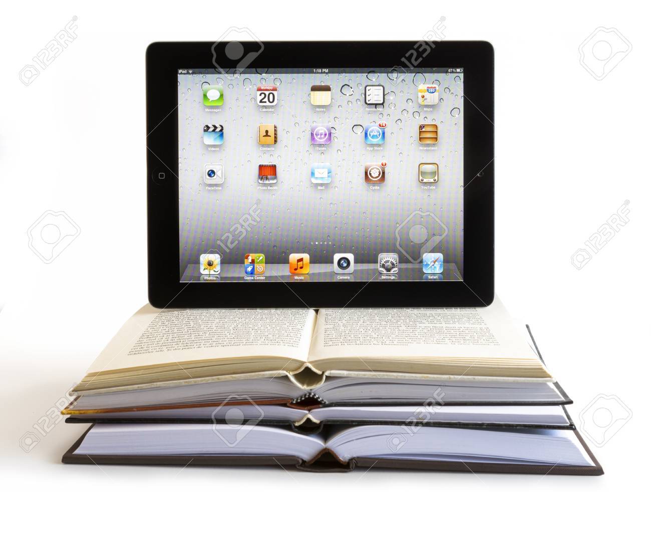 iPad 3 boasts a stunning retina display, a beefed up A5X dual-core processor, quad-core graphics. Studio shot on white background. - 18144565 iPad 3 boasts a stunning retina display, a beefed up A5X dual-core processor, quad-core graphics. Studio shot on white background. - 18144565